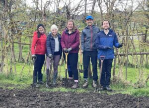 Corporate volunteering group at Elder Stubbs allotments.